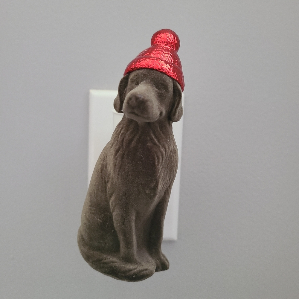 Used BBW Wallflower fragrance plug-in. Charming brown dog with knit hat.